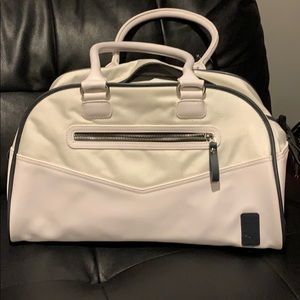 Adorable puma bowling style purse